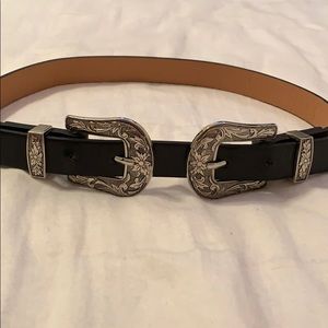 Double buckle belt.